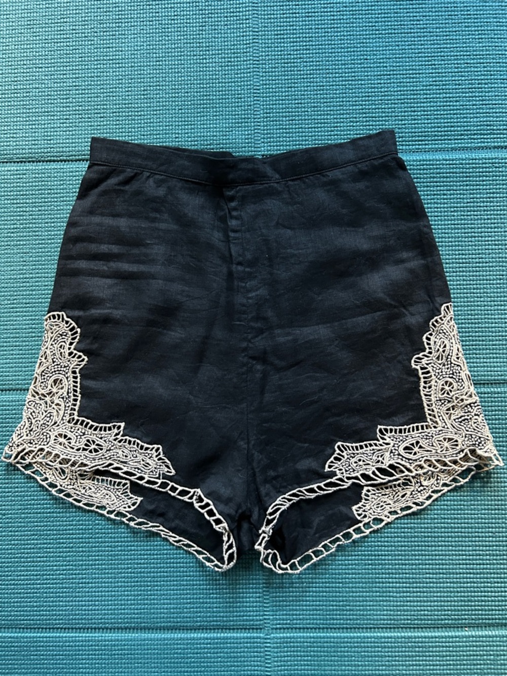 Chasing Unicorns black linen high waisted shorts.